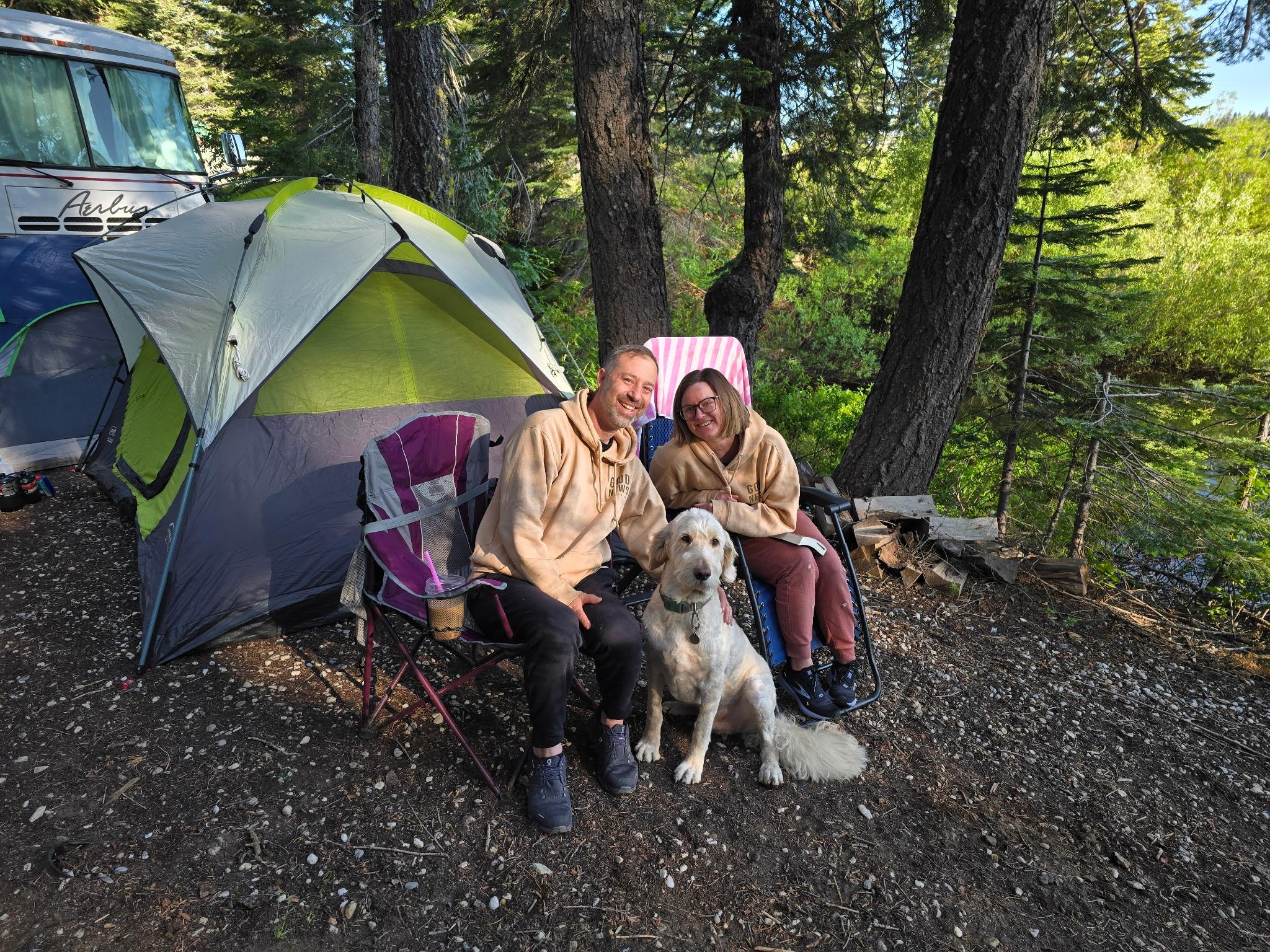 Essential Pet Spa owner camping with her husband and dog